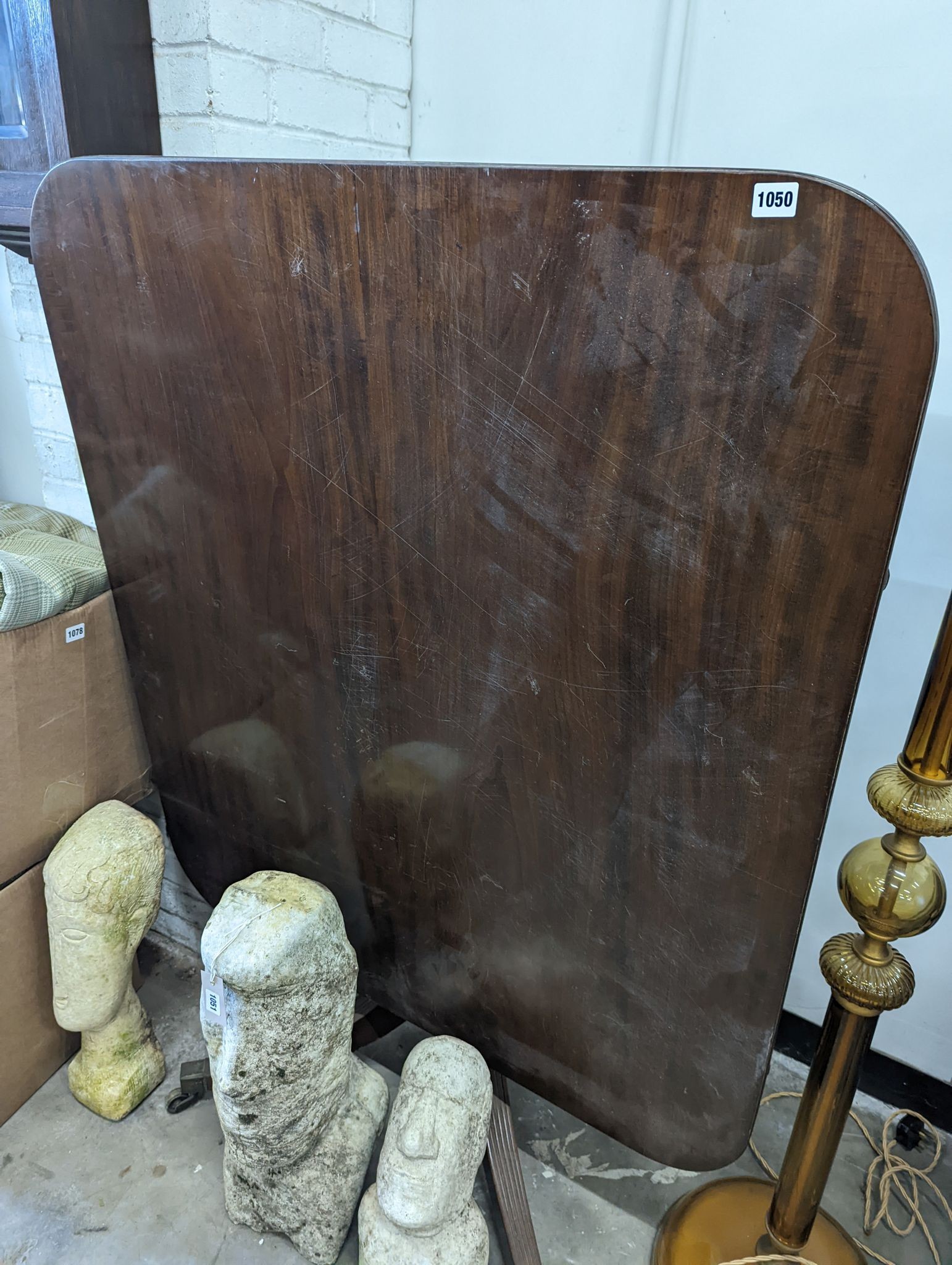 A Regency mahogany rectangular tilt top dining table, width 101cm, depth 118cm, height 72cm